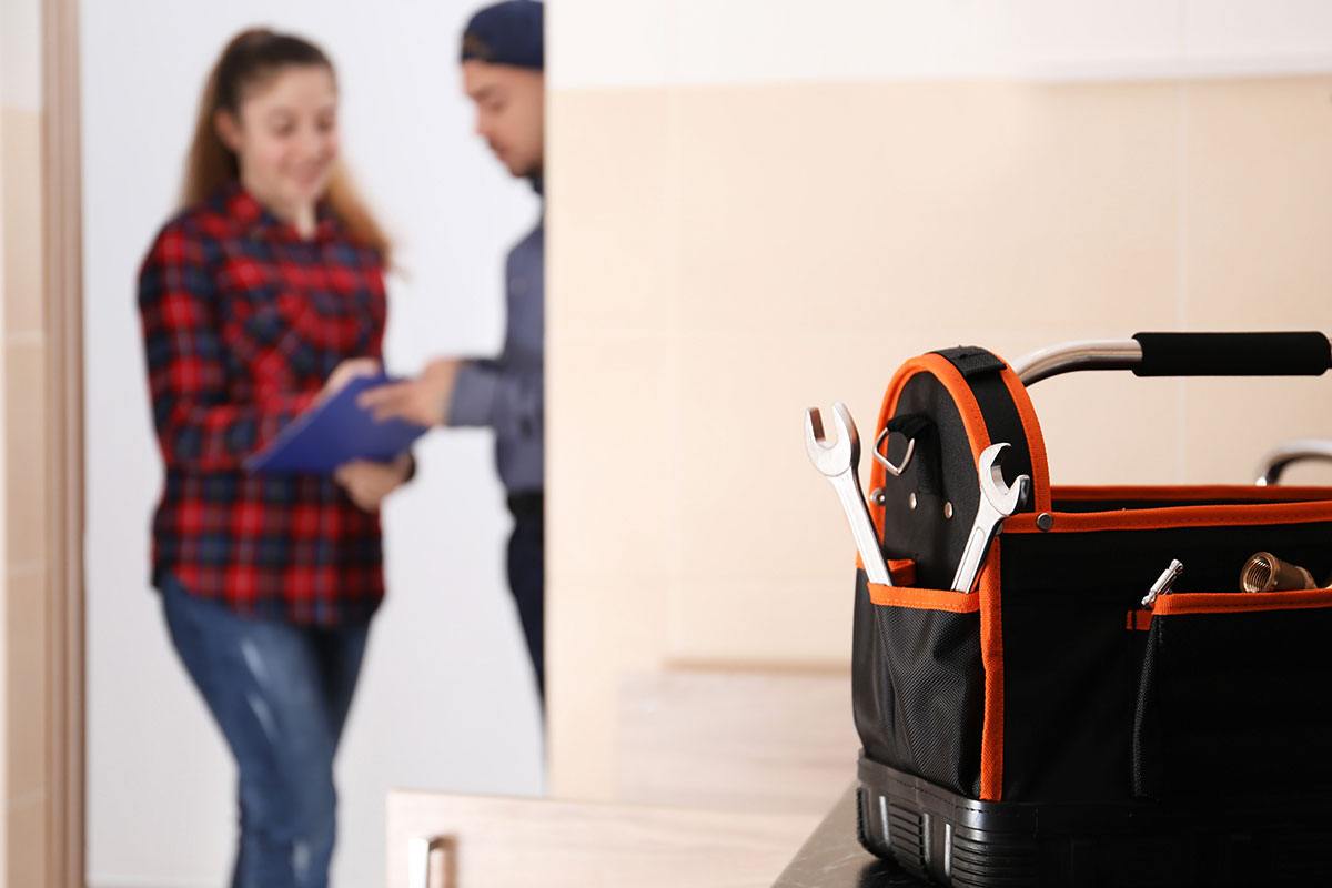 Contractor with homeowner at house