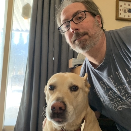 Bob with lab dog, Biscuit. 